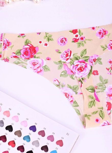 Трусы стринги женские La Volle  цветы 2XL бежевые 637 фото